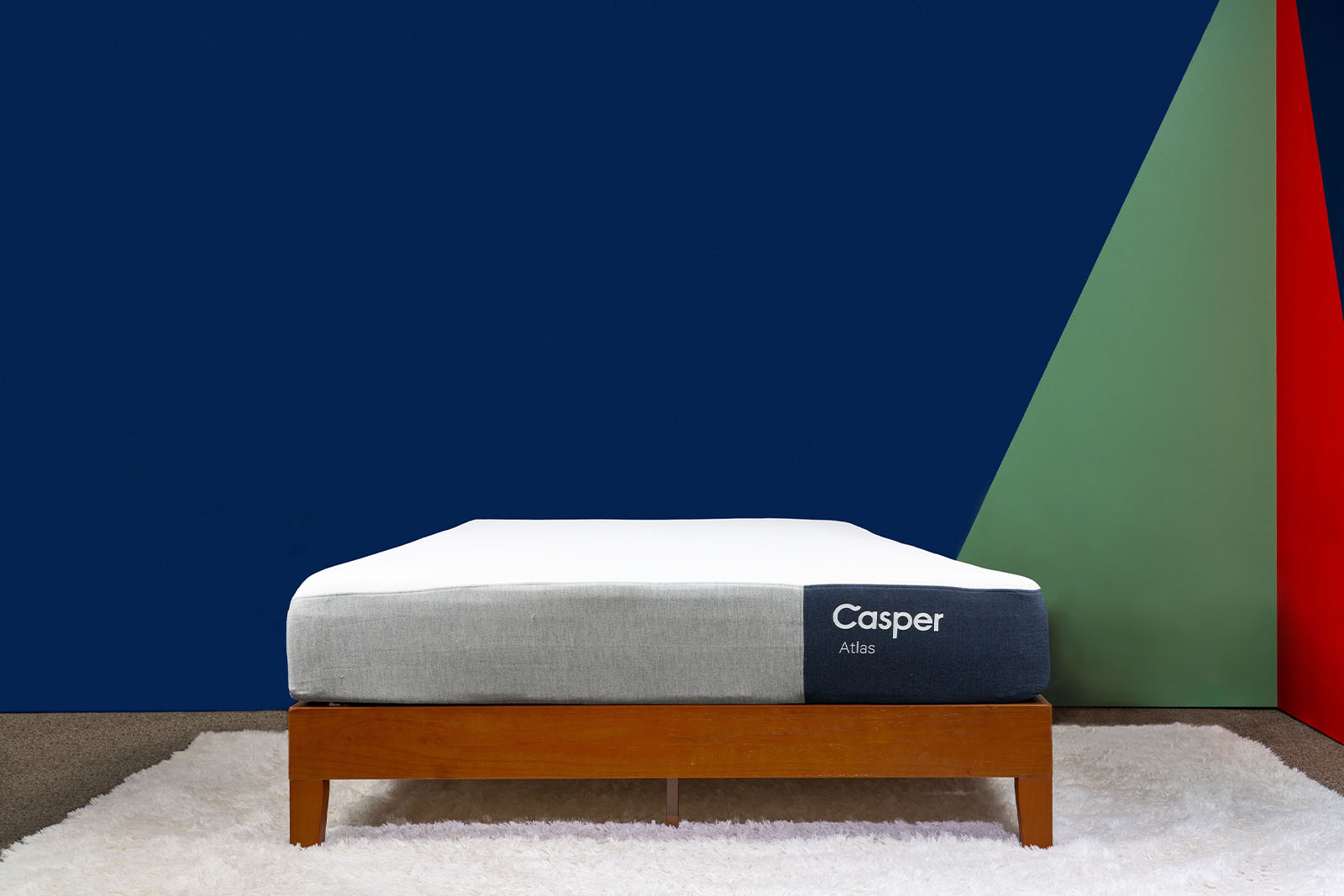 photo of the Casper Atlas mattress on a bed frame in a bedroom