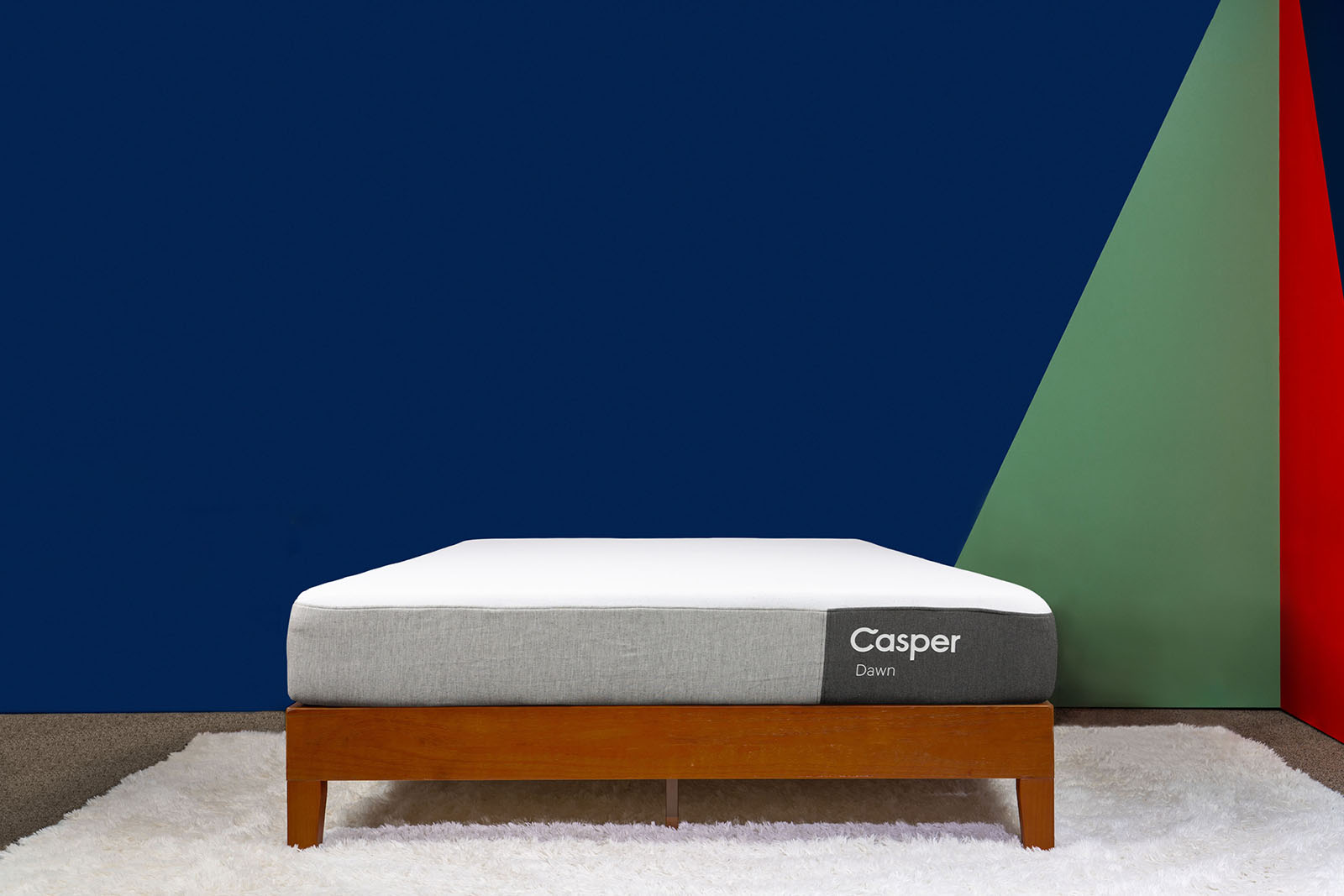 photo of the Casper Dawn mattress on a bed frame in a bedroom