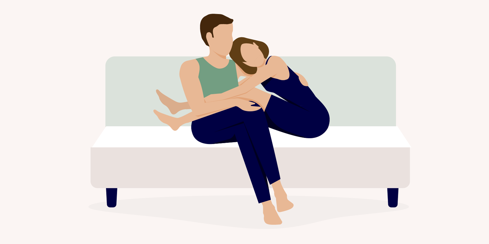 The Loveseat cuddling position a couple is embracing each other while sitting on a couch